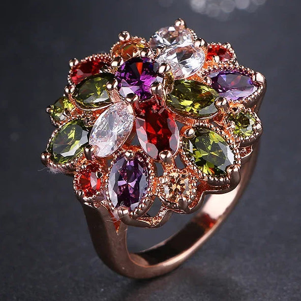 Multicolored gemstone ring on a dark background